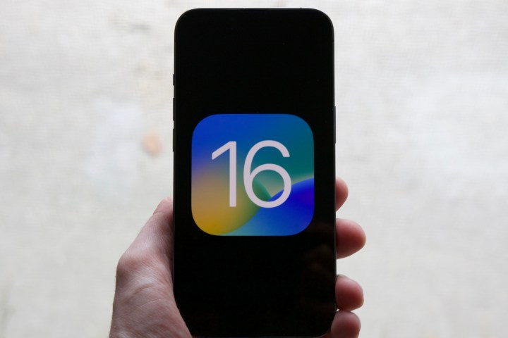 The iOS 16 logo on an iPhone.
