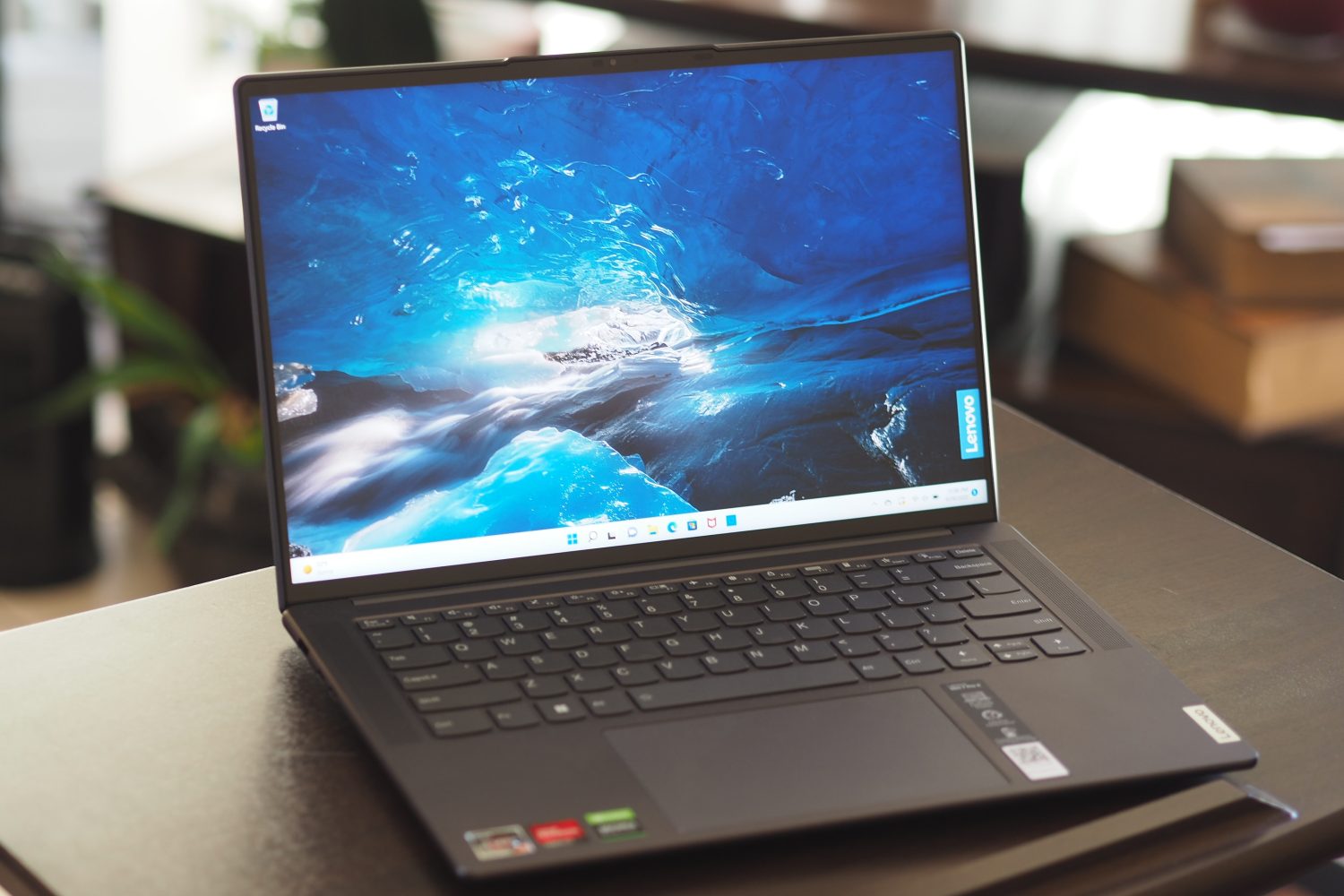 The Lenovo Slim 7 Pro X open on a table.