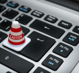 A keyboard with a miniature caution cone