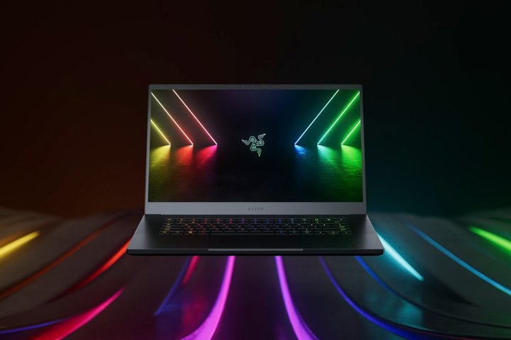 Razer Blade 15 gaming laptop with RGB lighting in the background.