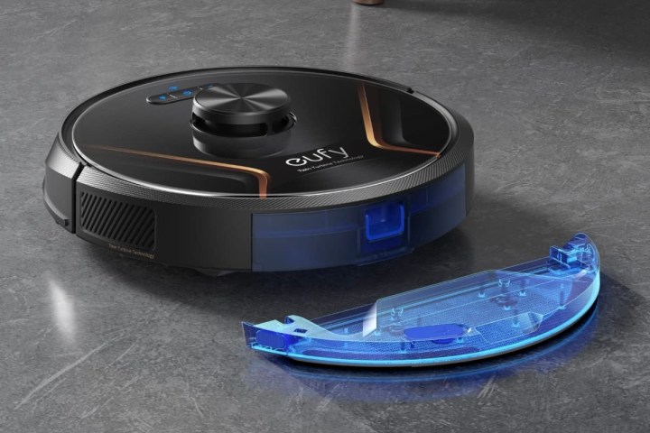 The Eufy Robovac X8 Hybrid is actively cleaning the floor.