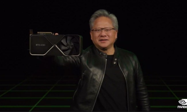 Nvidia CEO Jensen Huang with an RTX 4090 graphics card.
