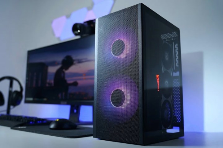 A mini-ITX PC setup with the SSUPD Meshlicious case.