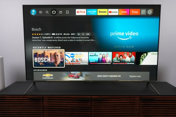 Amazon Fire TV Omni QLED with Fire TV OS on the screen.