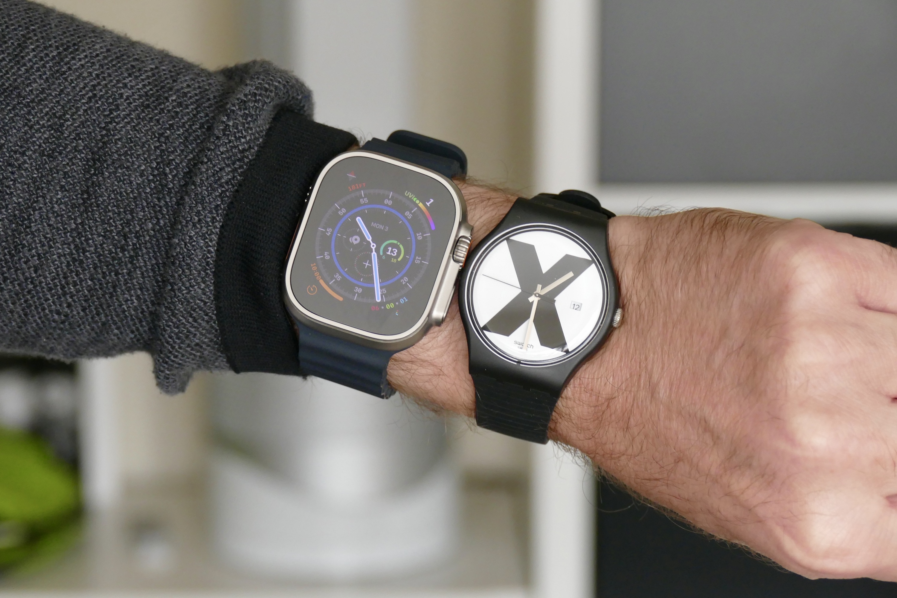 The Apple Watch Ultra and the Swatch XX-Rated watch.