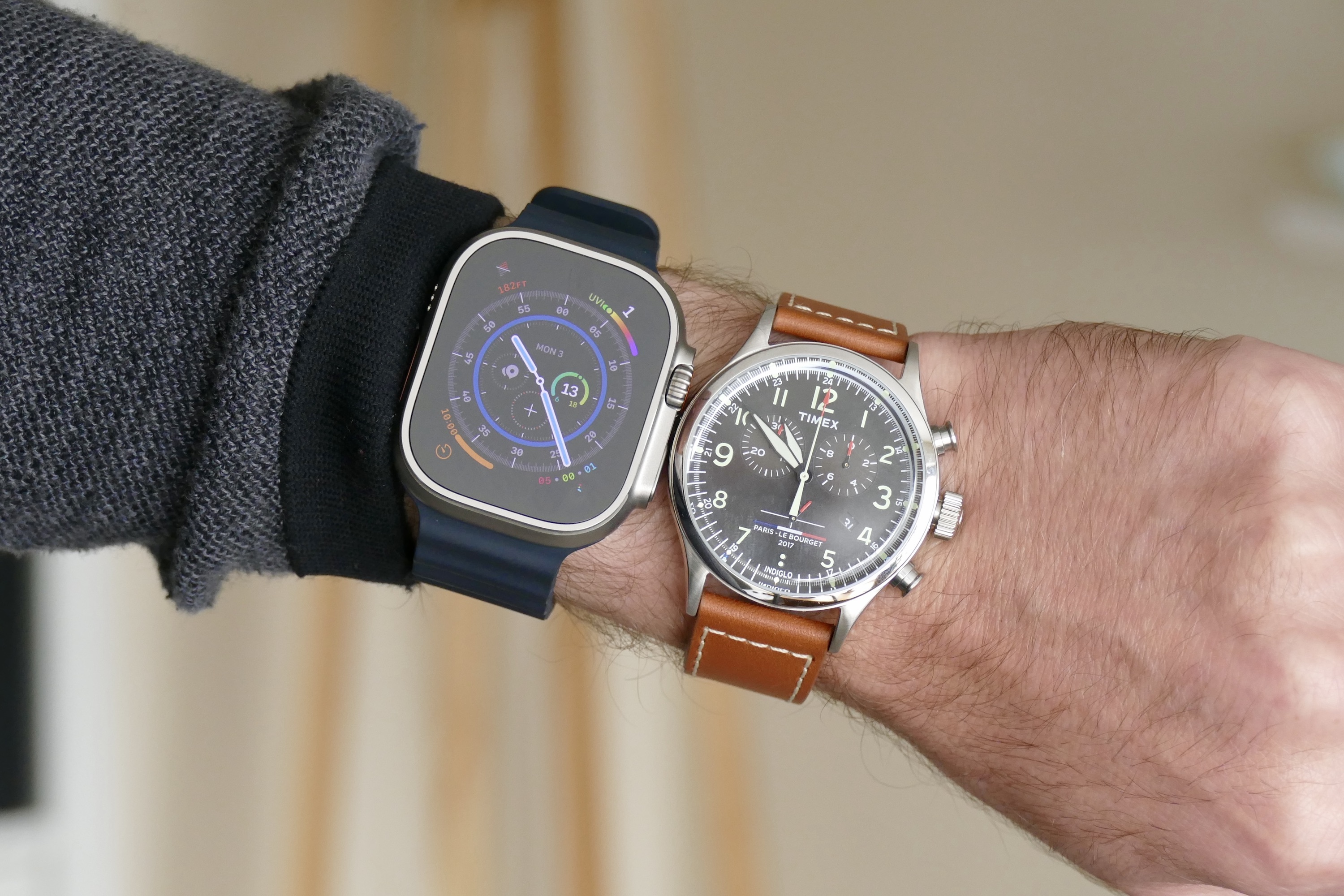 The Apple Watch Ultra and Timex Waterbury Chronograph.
