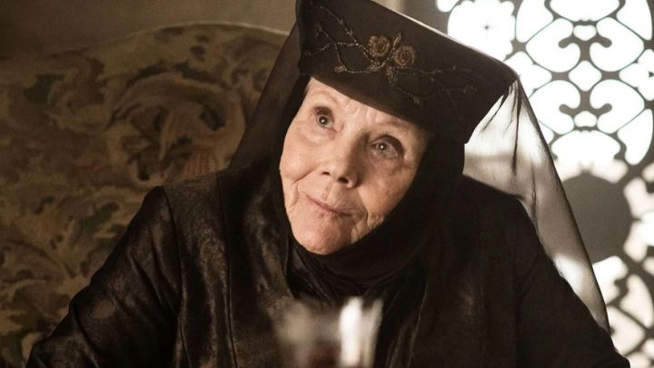 Lady Olenna Tyrell tilting her head and looking intently in Game of Thrones.