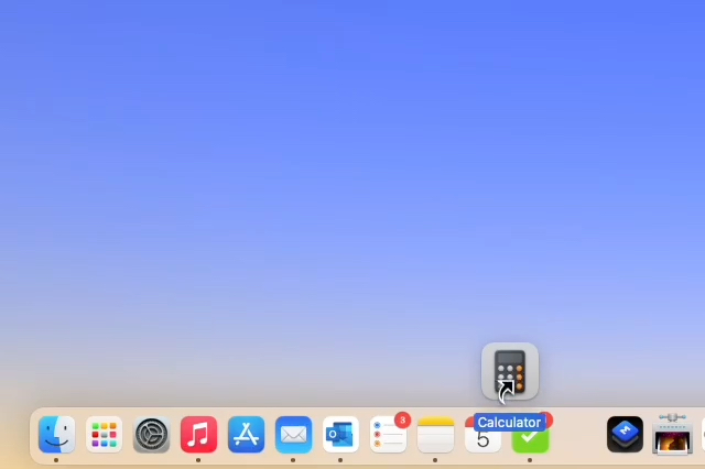 Dragging an app to the Mac Dock.