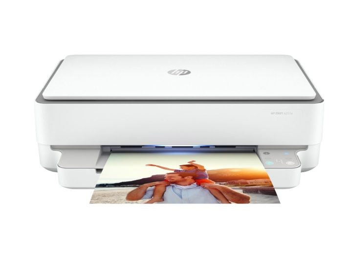 The HP Envy 6055e with a full color picture in its tray.