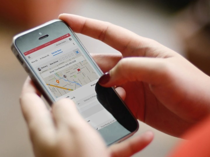 Ordering food from Grubhub with a smartphone mobile app.