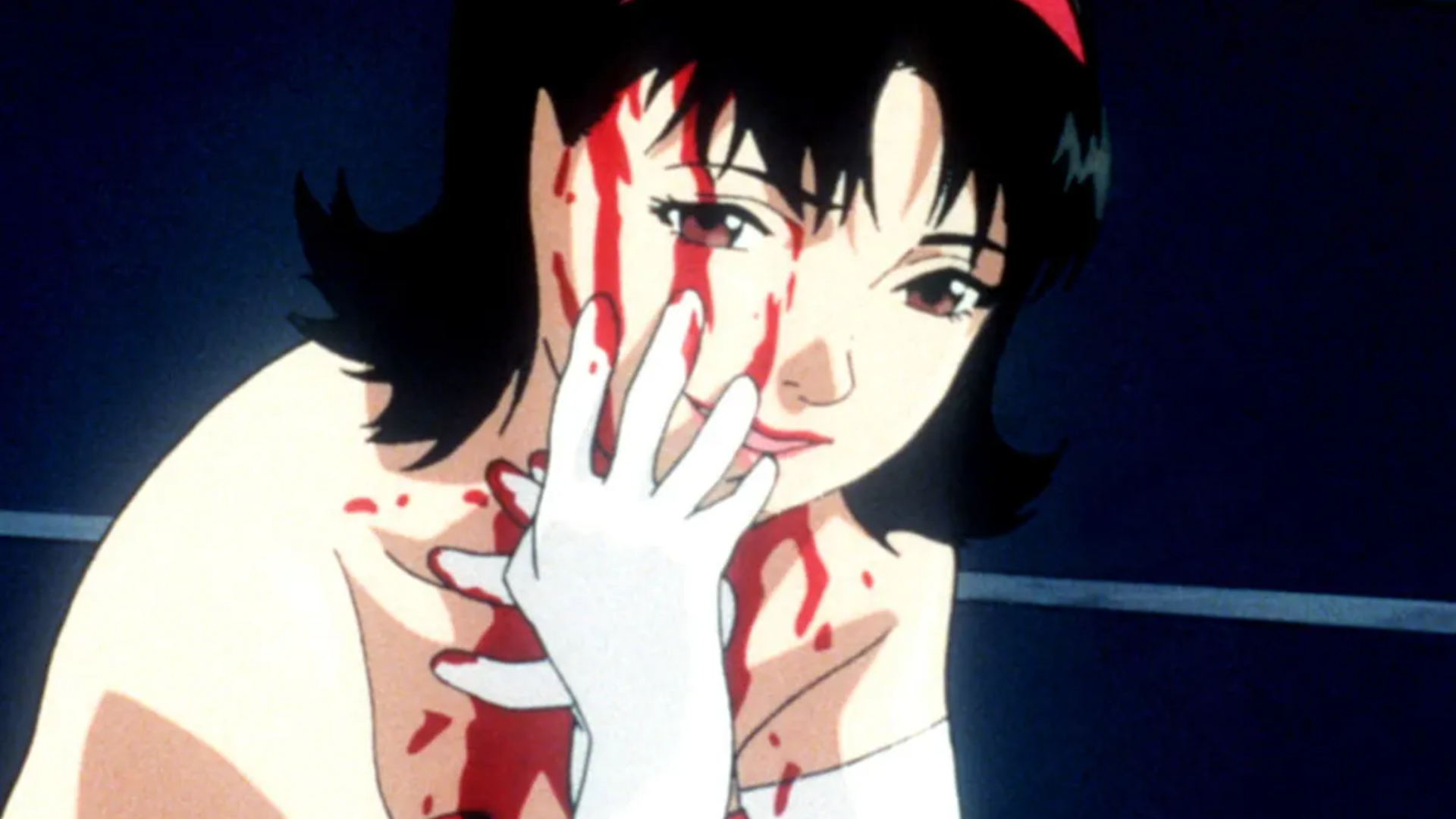 Mima Kirigoe smiling as she's covered in blood in Perfect Blue.