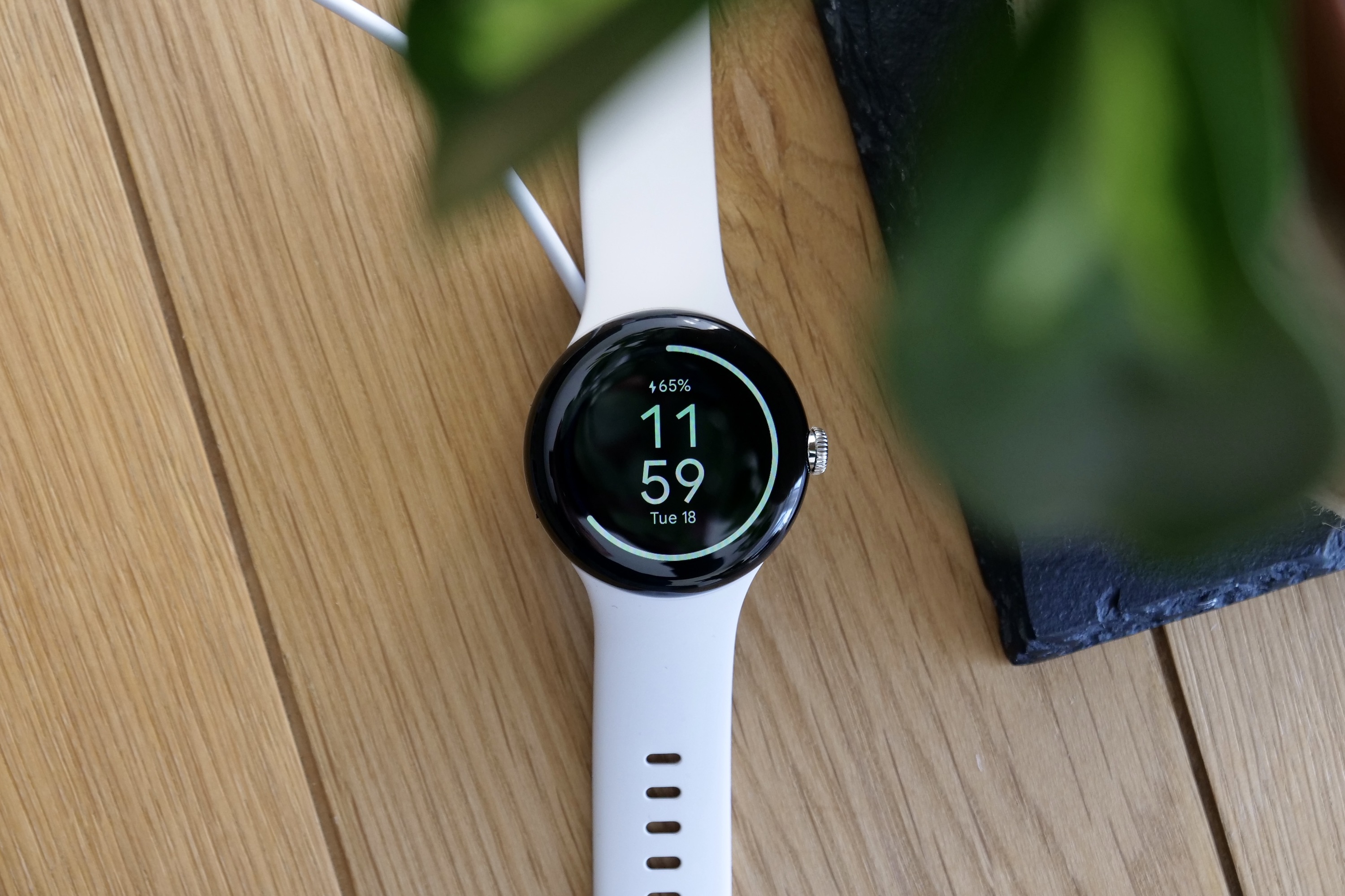 The Google Pixel Watch on charge.