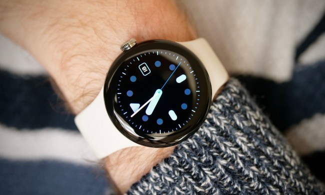 Google Pixel Watch worn on a man's wrist, showing the Pacific watch face.