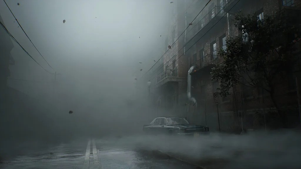 Uma rua nebulosa em Silent Hill.