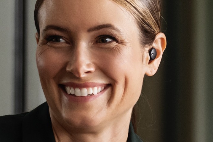 Woman wearing Sony CRE-E10 OTC hearing aids.