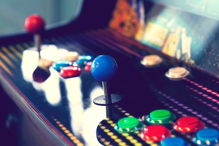 closeup on an arcade game's controls