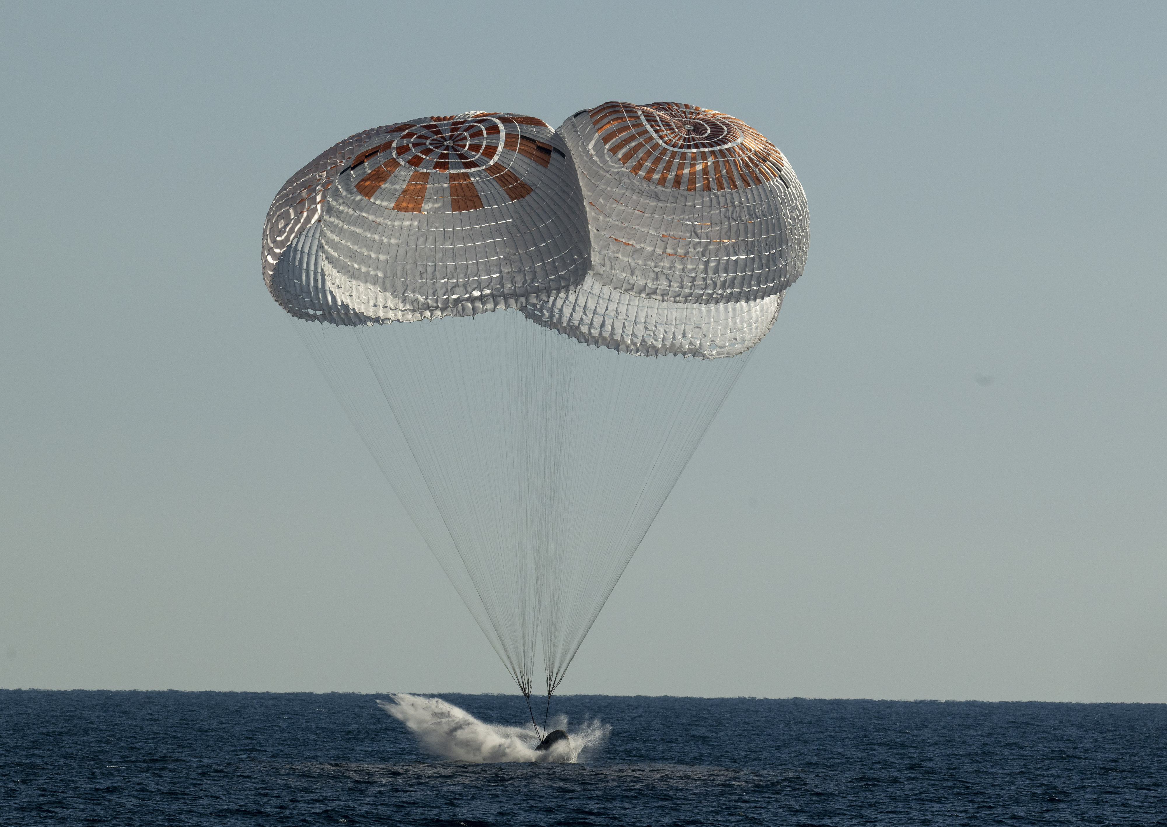 The splashdown of the SpaceX Crew Dragon Freedom spacecraft.