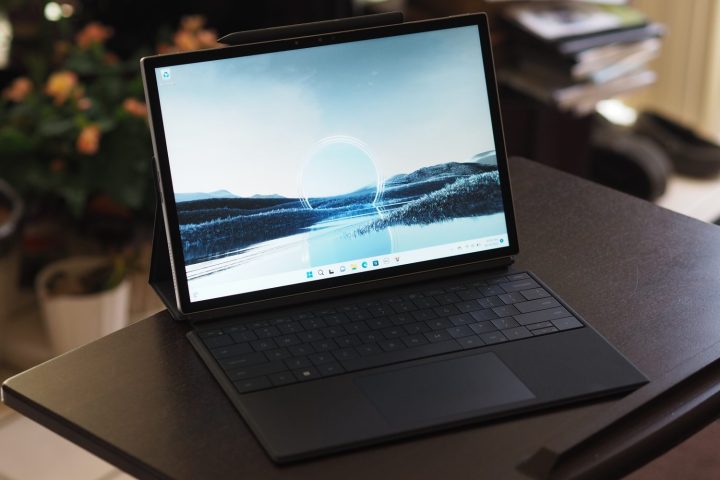 Front angle view of the Dell XPS 13 2-in-1 showing the display and folio keyboard.