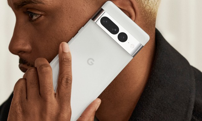 Someone holding a white Google Pixel 7 Pro.