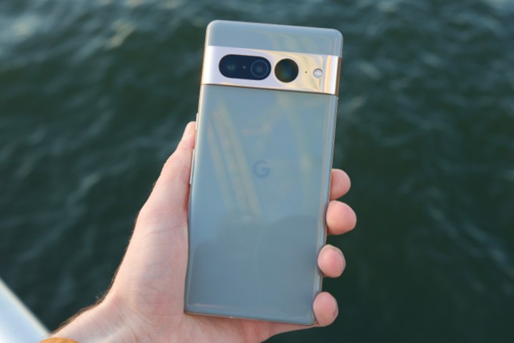 Someone holding a Google Pixel Pro 7 feat image.