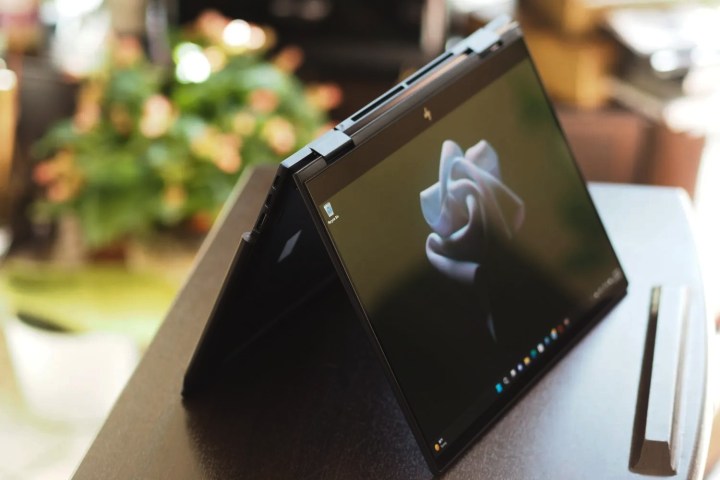 The Envy x360 13 in tent mode on a table.
