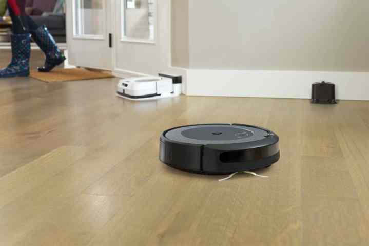 iRobot Roomba i3 EVO robot vacuum on hardwood floor.