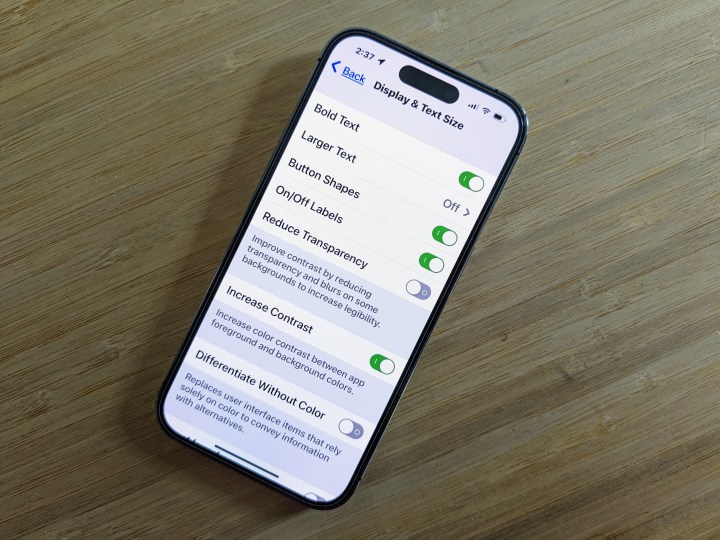 iPhone 14 Pro display with Accessibility settings for text