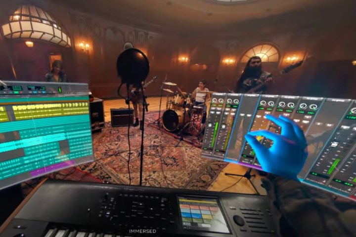 Digital hands directing a band using AR.