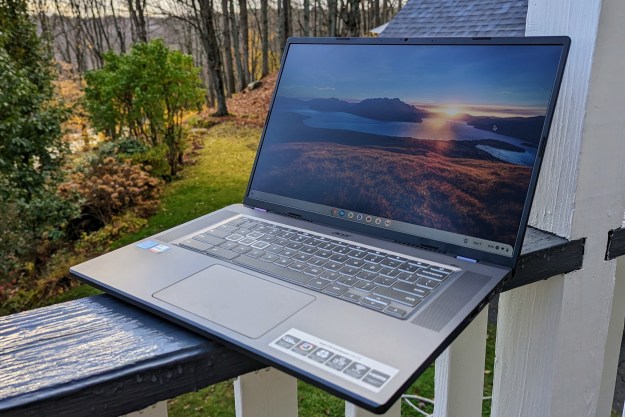 Acer 516 GE on railing outdoors at dawn.