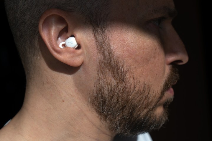 Wearing the Anker Soundcore Sleep A10 earbuds.