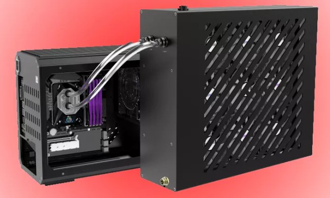 A Bykski B-1080-CEC-X external cooler next to a mid-size PC tower with tubes feeding into the side against a rose background