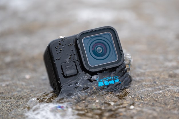 The GoPro Hero 11 Mini getting hit by a wave.