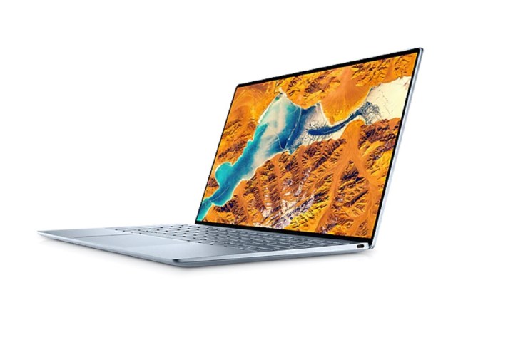 Ноутбук Dell XPS 13, вид сбоку на белом фоне.