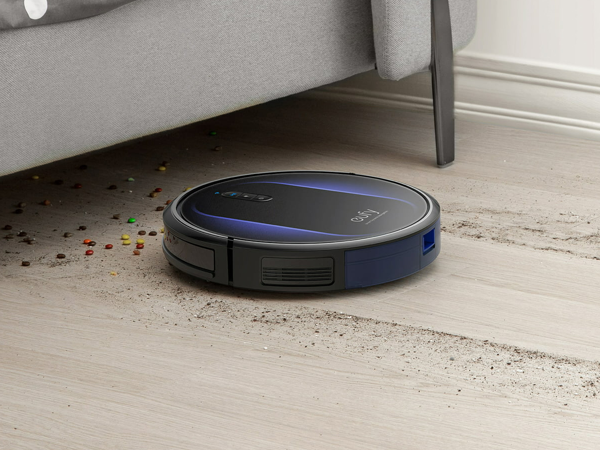 The Eufy Clean RoboVac G32 Pro Robot Vacuum sweeping the floor.