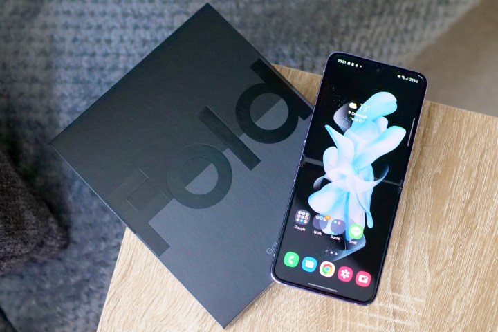 The Galaxy Z Flip 4 opens on top of the Z Fold 4 box.