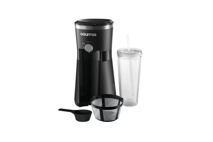 The Gourmia Iced Coffee Maker with scoop, reusable filter, and the included tumbler.