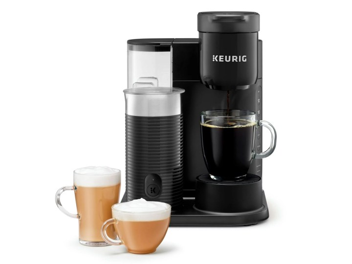 The Keurig K-Cafe Essentials coffee maker brews a cup of coffee.