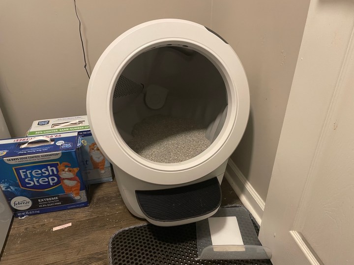 The Litter Robot 4 in the corner of a room.