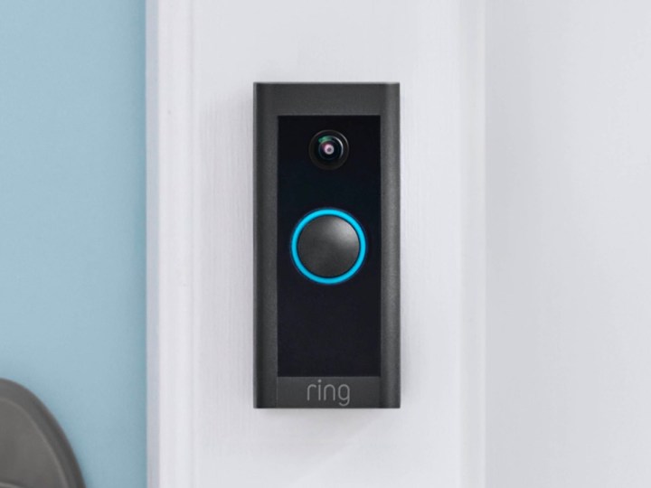 The Ring Wifi Video Doorbell mounted by a front door.