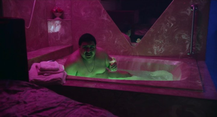 A man sits in a tub from in a scene from All Jacked Up and Full of Worms.