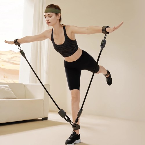 Woman working out with WEGYM resistance bands.