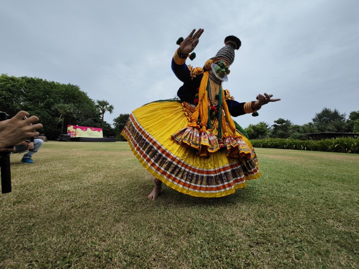 Classical Indian Kathakali dancer on grass captured with the Xiaomi 12S Ultra.