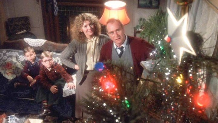 A family looks at a Christ mas tree in A Christmas Story.