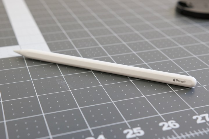 The 2nd gen Apple Pencil laying on a table.