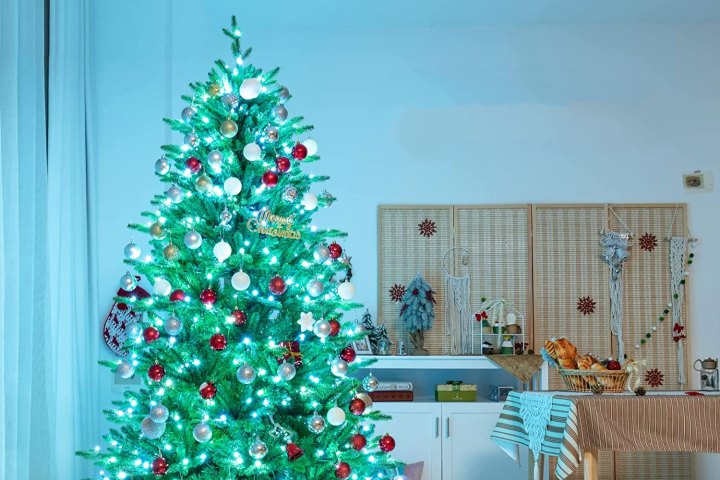 Goflame smart Christmas tree set up in living room.  