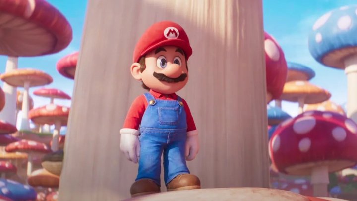 Mario stands on a mushroom in the movie Super Mario Bros.