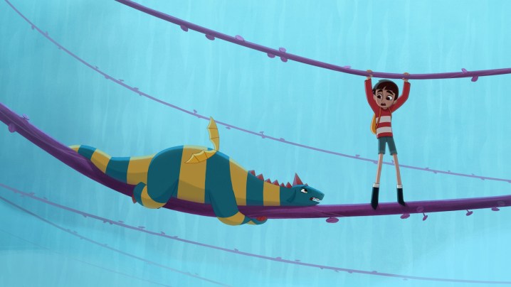 Um menino e um dragão tentam atravessar uma ponte de corda em uma cena de My Father's Dragon.