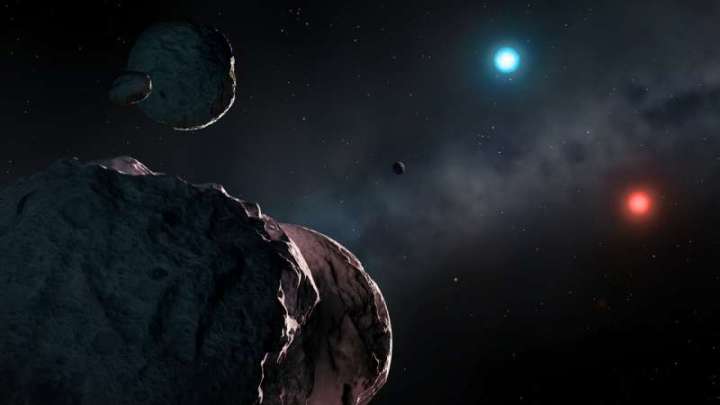 Artist’s impression of the old white dwarfs WDJ2147-4035 and WDJ1922+0233 surrounded by orbiting planetary debris, which will accrete onto the stars and pollute their atmospheres. WDJ2147-4035 is extremely red and dim, while WDJ1922+0233 is unusually blue. 