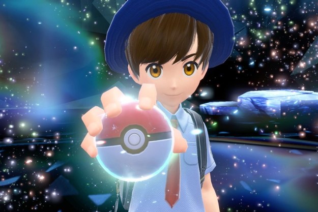 A Pokemon student holds a Pokeball in Pokemon Scarlet and Violet.