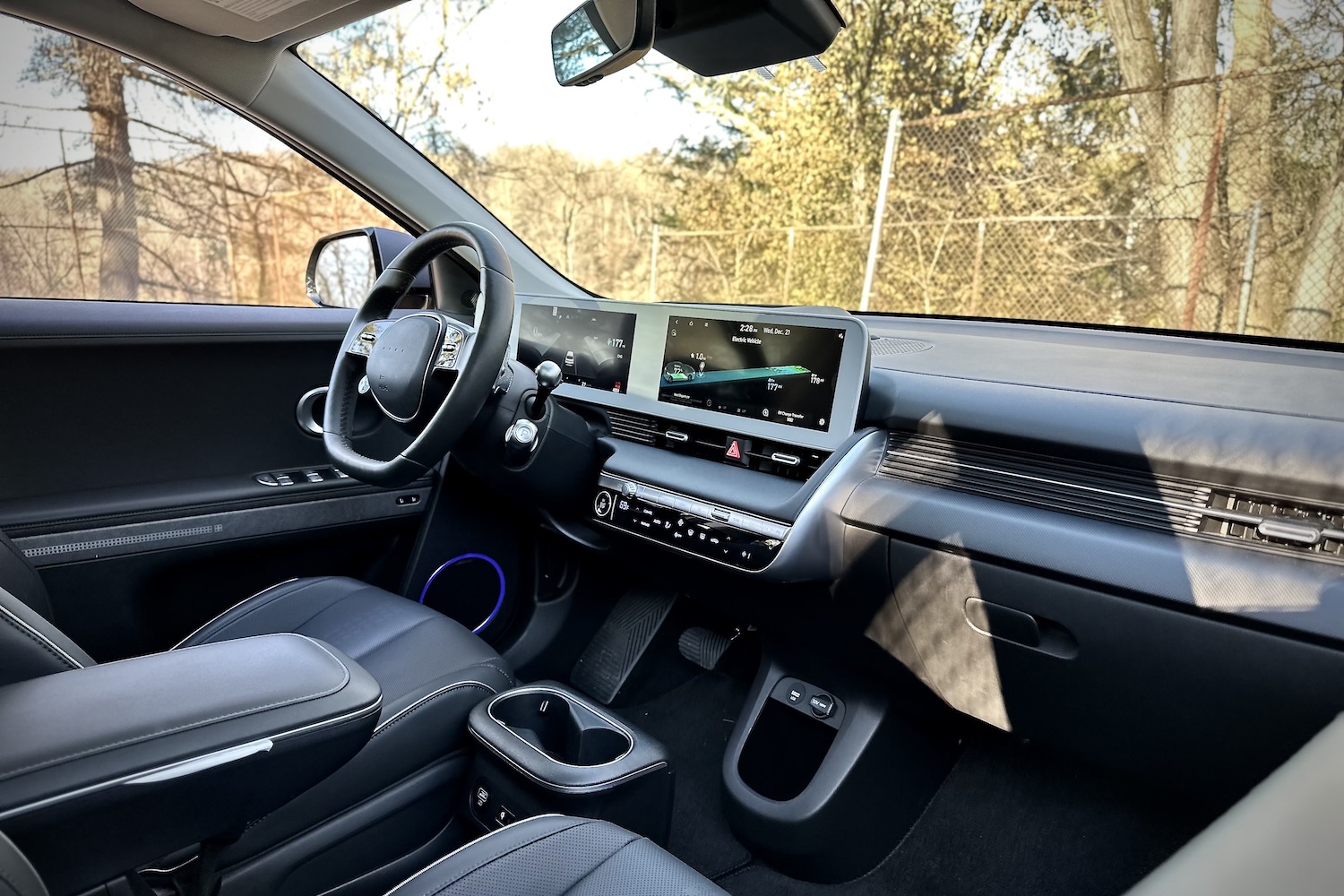 2022 Hyundai Ioniq 5 Limited AWD dashboard with trees in the back.